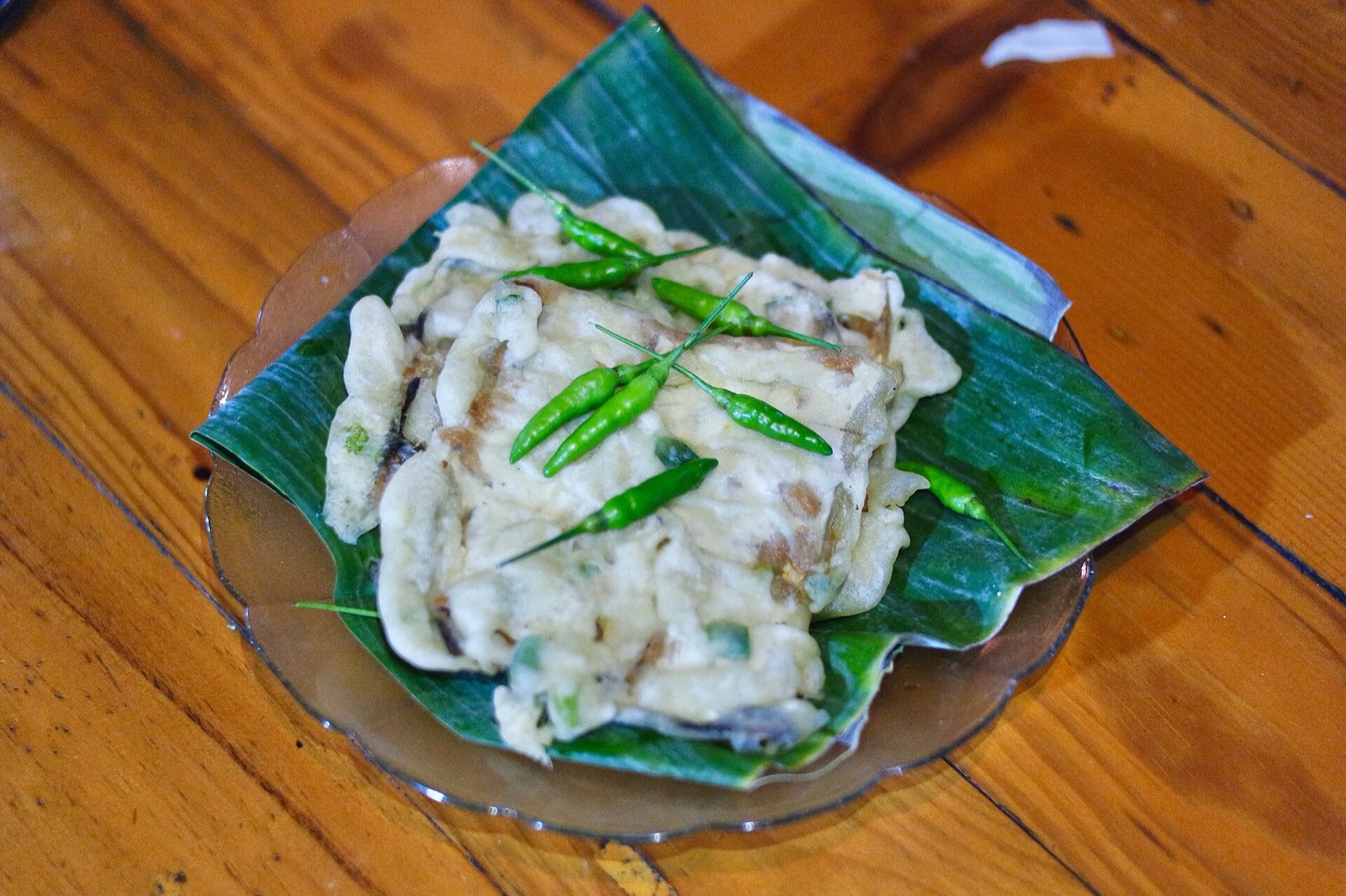 A platter of mendoan, soft half-fried tempeh.
