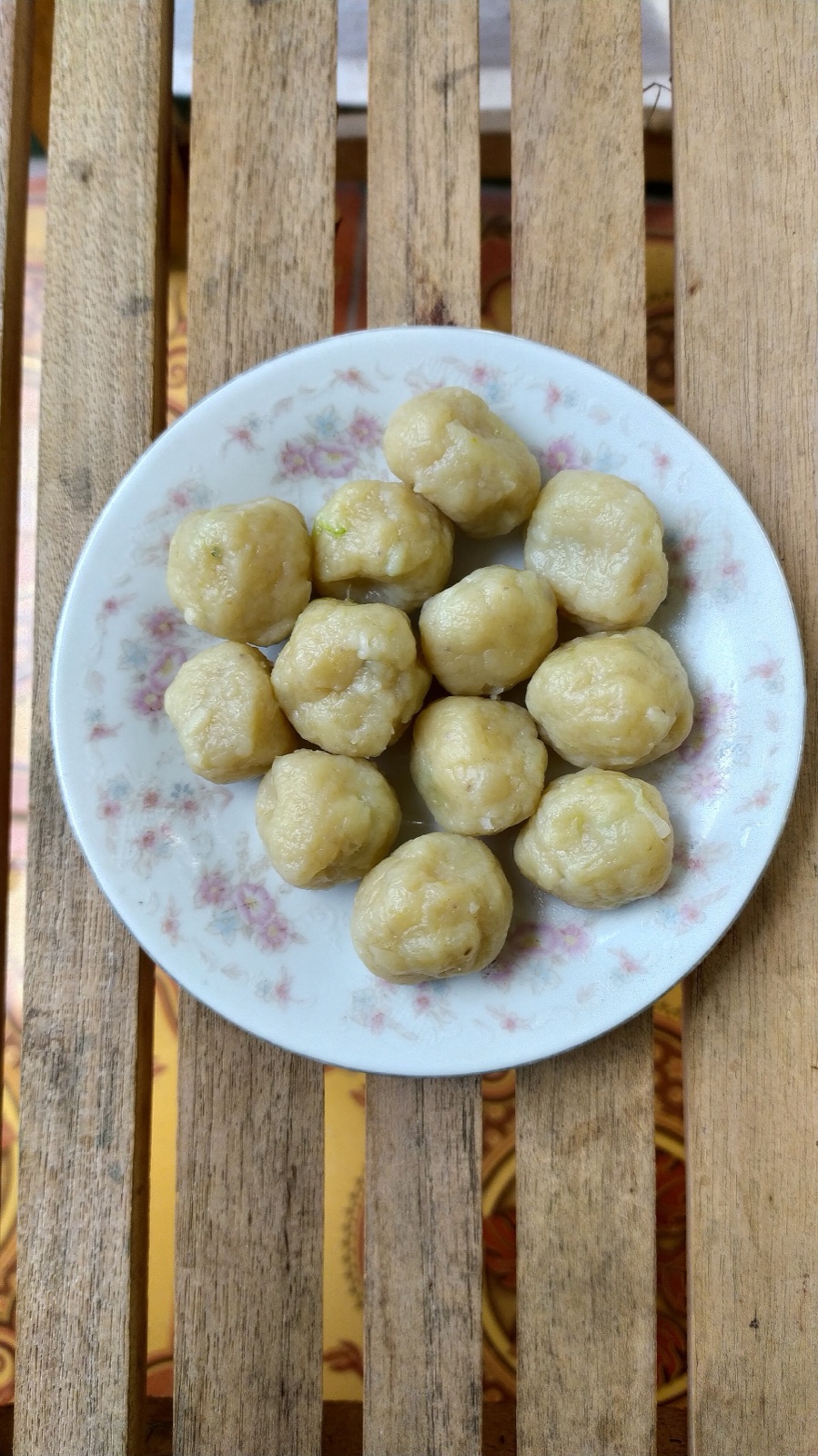Tapioca balls (cilok) threaded on bamboo skewers.